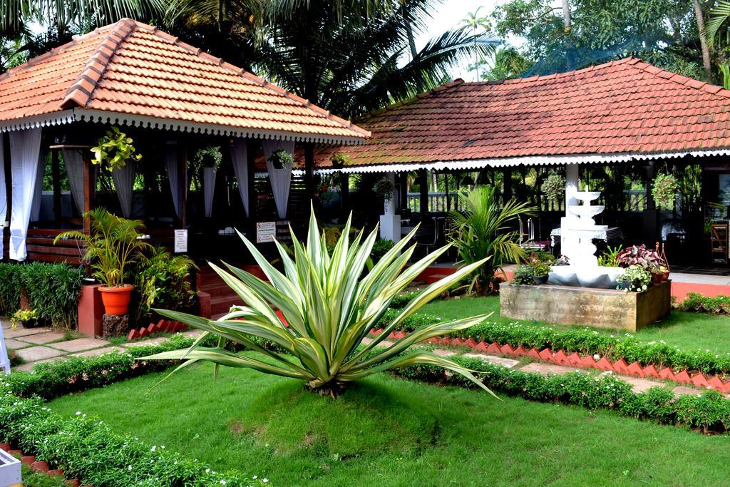Naga Cottages Morjim Exterior foto